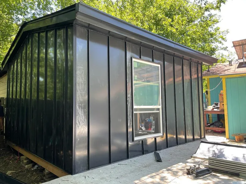 Black standing seam metal wall panels for Metal Roof Installation in Vinings